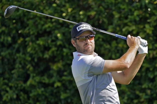 Corey Conners, of Canada, watches his tee shot on the ninth hole during the second round of the Arnold Palmer Invitational golf tournament Friday, March 5, 2021, in Orlando, Fla. (AP Photo/John Raoux)