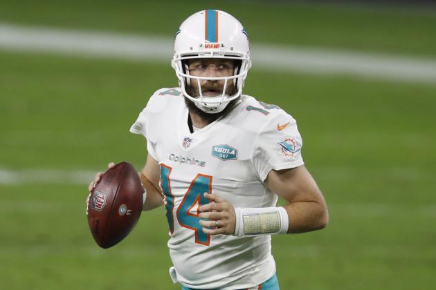 Miami Dolphins quarterback Ryan Fitzpatrick (14) looks to throw a pass against the Las Vegas Raiders during an NFL football game, Saturday, Dec. 26, 2020, in Las Vegas.The Dolphins won the game 26-25. (Jeff Haynes/AP Images for Panini)