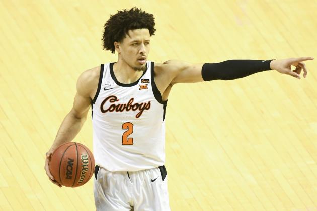 Oklahoma State guard Cade Cunningham (2)points during an NCAA college basketball game Monday, March. 1, 2021, in Stillwater, Okla. (AP Photo/Brody Schmidt)