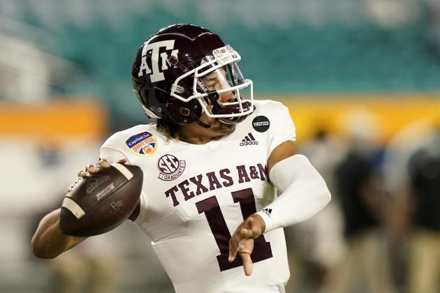 Texas A&M quarterback Kellen Mond (11) warms up before the Orange Bowl NCAA college football game against North Carolina, Saturday, Jan. 2, 2021, in Miami Gardens, Fla.(AP Photo/Lynne Sladky)