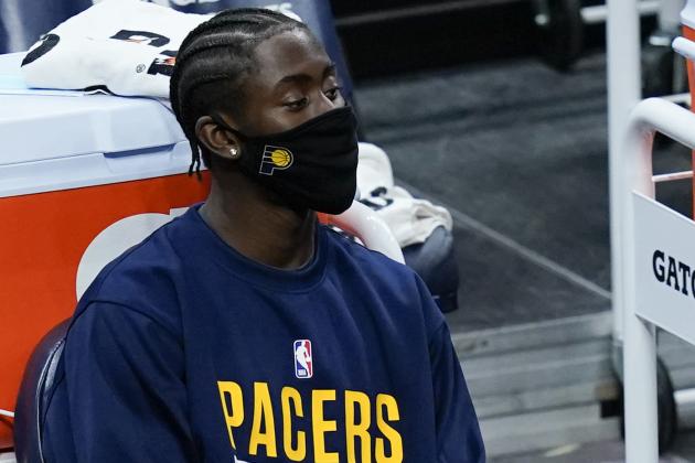 Indiana Pacers' Caris LeVert watches from the bench during the first half of an NBA basketball game against the Dallas Mavericks, Wednesday, Jan. 20, 2021, in Indianapolis. (AP Photo/Darron Cummings)