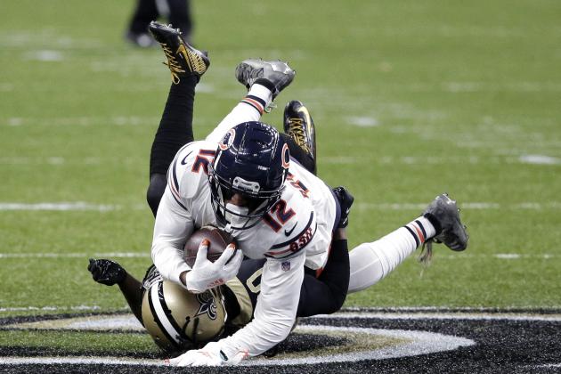 Chicago Bears wide receiver Allen Robinson (12) is tackled by New Orleans Saints cornerback Janoris Jenkins in the second half of an NFL wild-card playoff football game in New Orleans, Sunday, Jan. 10, 2021. (AP Photo/Butch Dill)