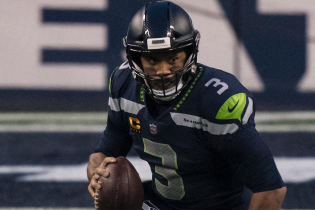 Seattle Seahawks quarterback Russell Wilson runs with the ball during the second half of an NFL wild-card playoff football game against the Los Angeles Rams, Saturday, Jan. 9, 2021, in Seattle. The Rams won 30-20. (AP Photo/Stephen Brashear) Seattle Seahawks quarterback Russell Wilson runs with the ball during the second half of an NFL wild-card playoff football game against the Los Angeles Rams, Saturday, Jan. 9, 2021, in Seattle. The Rams won 30-20. (AP Photo/Stephen Brashear)