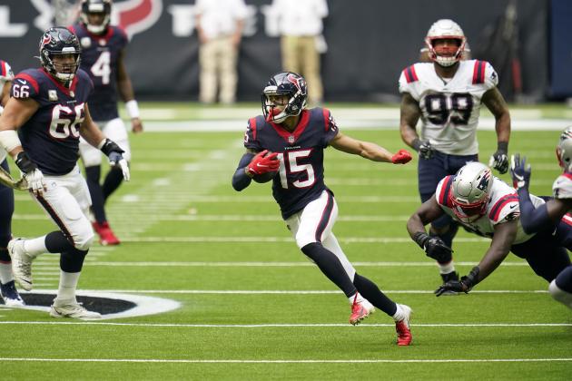 Houston Texans wide receiver Will Fuller V (15) carries the ball after a reception during an NFL football game against the New England Patriots, Sunday, Nov. 22, 2020, in Houston. (AP Photo/Matt Patterson)