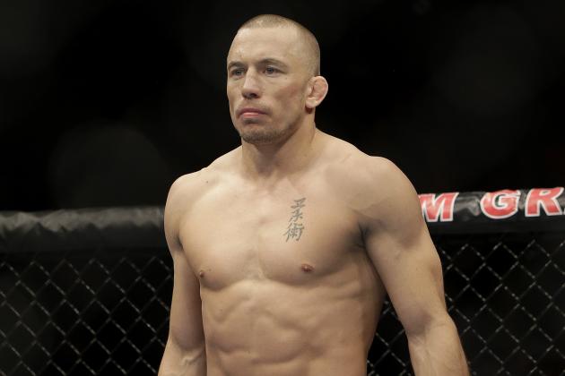 Georges St. Pierre, of Canada, waits to begin a UFC 167 mixed martial arts championship welterweight bout against Johny Hendricks on Saturday, Nov. 16, 2013, in Las Vegas. St. Pierre won by split decision. (AP Photo/Isaac Brekken)