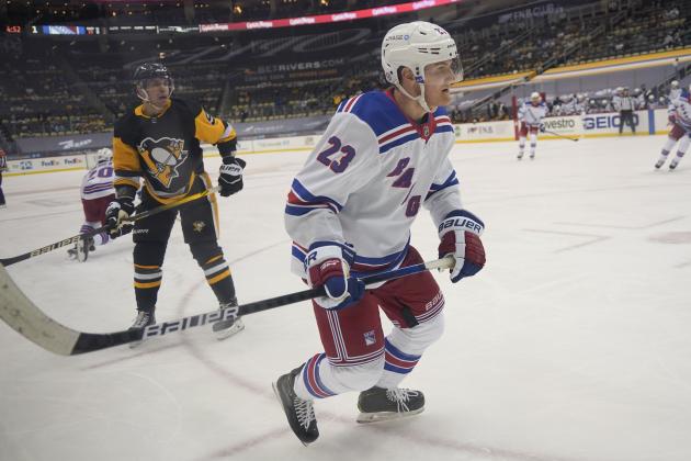 New York Rangers' Adam Fox (23) plays against the Pittsburgh Penguins during an NHL hockey game, Sunday, March 7, 2021, in Pittsburgh. (AP Photo/Keith Srakocic)