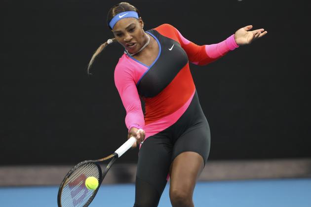 Romania's Simona Halep hits a forehand return to United States' Serena Williams during their match at the Australian Open Tennis championships in Melbourne, Australia, Tuesday, Feb. 16, 2021. (AP Photo/Hamish Blair)