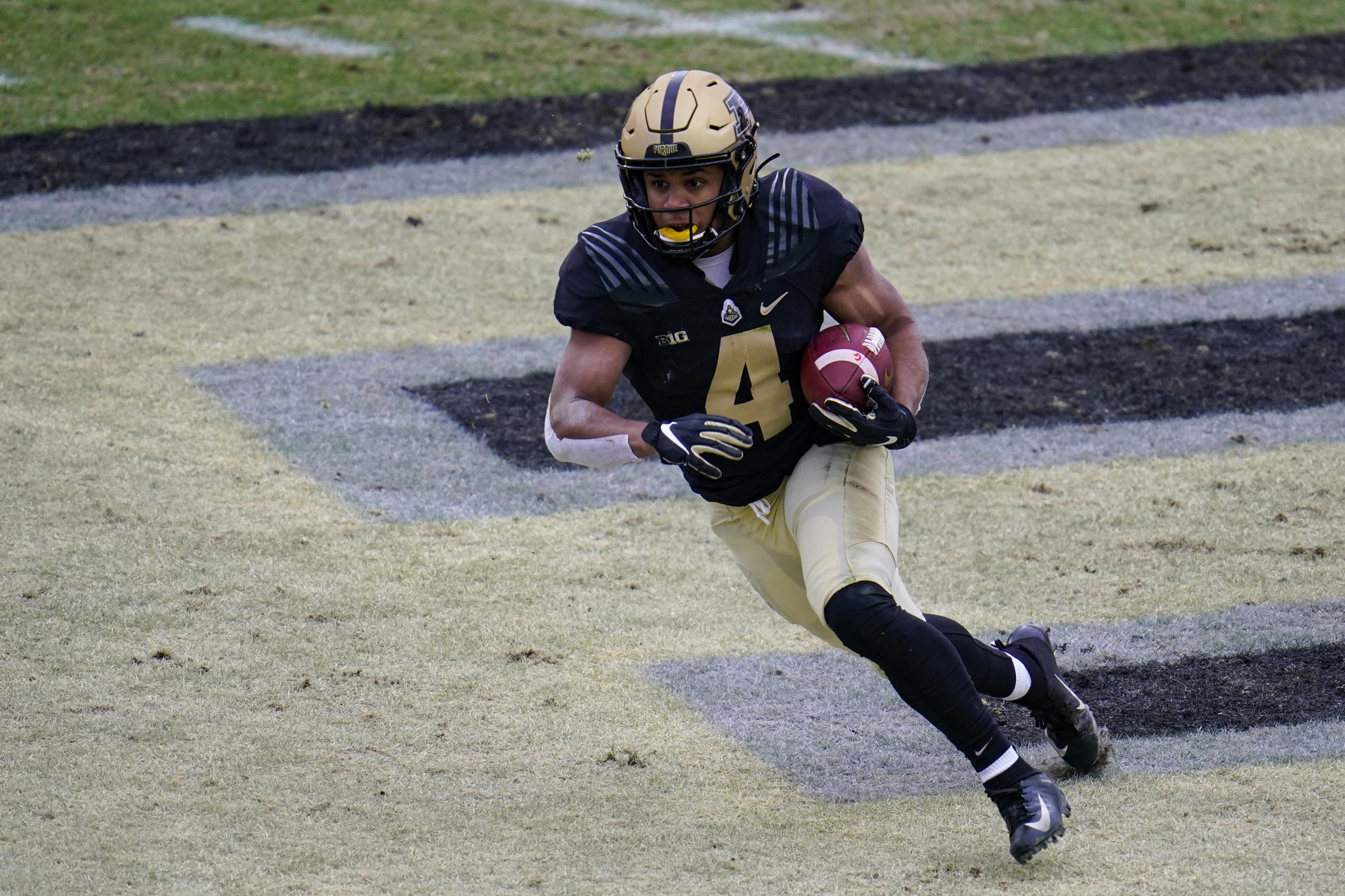 Rondale Moore Purdue Boilermakers Unsigned Avoids Tackle Photograph