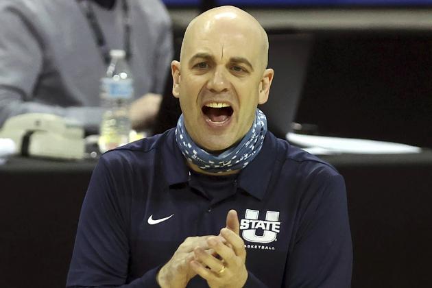FILE- In this Friday, March 12, 2021, file photo, Utah State head coach Craig Smith reacts to a basket during the second half of an NCAA college basketball game against Colorado State in the semifinal round of the Mountain West Conference tournament in Las Vegas. Utah State and Texas Tech meet in a first-round game in the South Region on Friday. (AP Photo/Isaac Brekken, File)