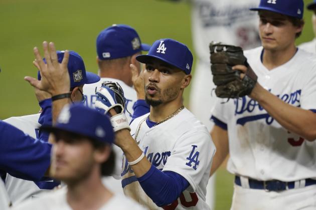 Los Angeles Dodgers right fielder Mookie Betts celebrates their win against the Tampa Bay Rays in Game 1 of the baseball World Series Tuesday, Oct. 20, 2020, in Arlington, Texas. The Dodgers defeated the Rays 8-3 to lead the series 1-0 games. (AP Photo/Eric Gay)