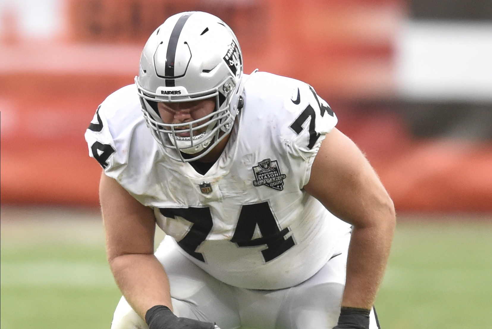 Las Vegas Raiders offensive tackle Kolton Miller (74) warms up before an  NFL preseason football game against the New England Patriots, Friday, Aug.  26, 2022, in Las Vegas. (AP Photo/John Locher Stock