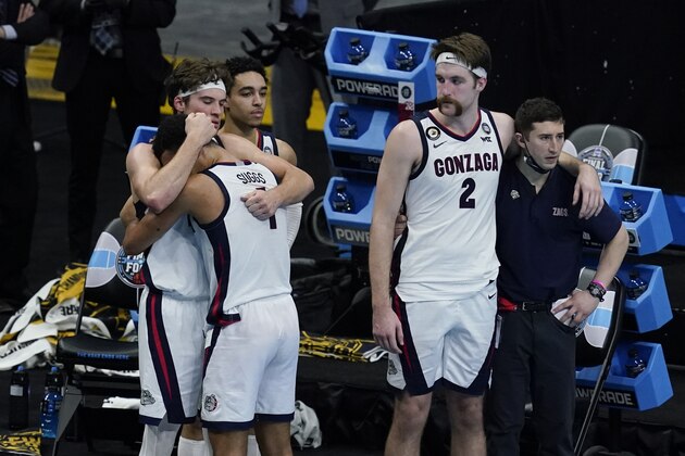 Gonzaga forward Corey Kispert (24) hugs Jalen Suggs (1) as Gonzaga forward Drew Timme (2) looks on at the end of the championship game against Baylor in the men's Final Four NCAA college basketball tournament, Monday, April 5, 2021, at Lucas Oil Stadium in Indianapolis. Baylor won 86-70. (AP Photo/Darron Cummings) Gonzaga forward Corey Kispert (24) hugs Jalen Suggs (1) as Gonzaga forward Drew Timme (2) looks on at the end of the championship game against Baylor in the men's Final Four NCAA college basketball tournament, Monday, April 5, 2021, at Lucas Oil Stadium in Indianapolis. Baylor won 86-70. (AP Photo/Darron Cummings)