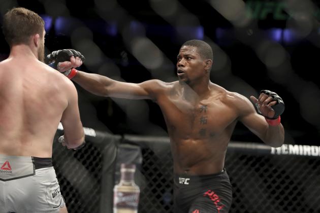 Kevin Holland, right, in action against Gerald Meerschaert during their mixed martial arts bout at UFC Fight Night, Saturday, March 30, 2019, in Philadelphia. Holland won via decision. (AP Photo/Gregory Payan)