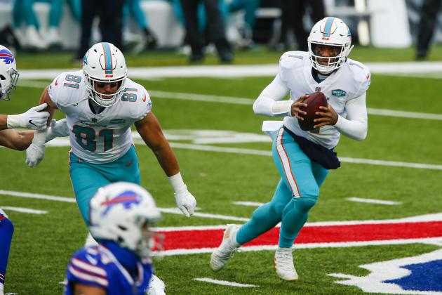Miami Dolphins quarterback Tua Tagovailoa (1) looks to pass on the run during the first half of an NFL football game against the Buffalo Bills, Sunday, Jan. 3, 2021, in Orchard Park, N.Y. (AP Photo/John Munson)