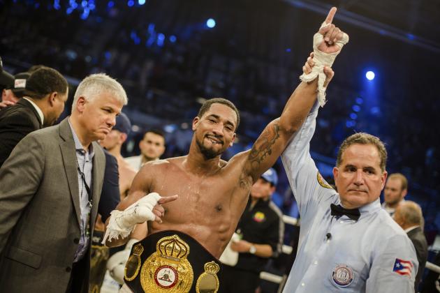 In this March 11, 2017 photo, US boxer Demetrius Andrade  celebrates his victory in Ludwigshafen, Germany.  Demetrius Andrade defeated  Jack Culcay by split decision to take the Ecuadorian-born German's WBA super welterweight title on Saturday. (Christoph Schmidt/dpa via AP)