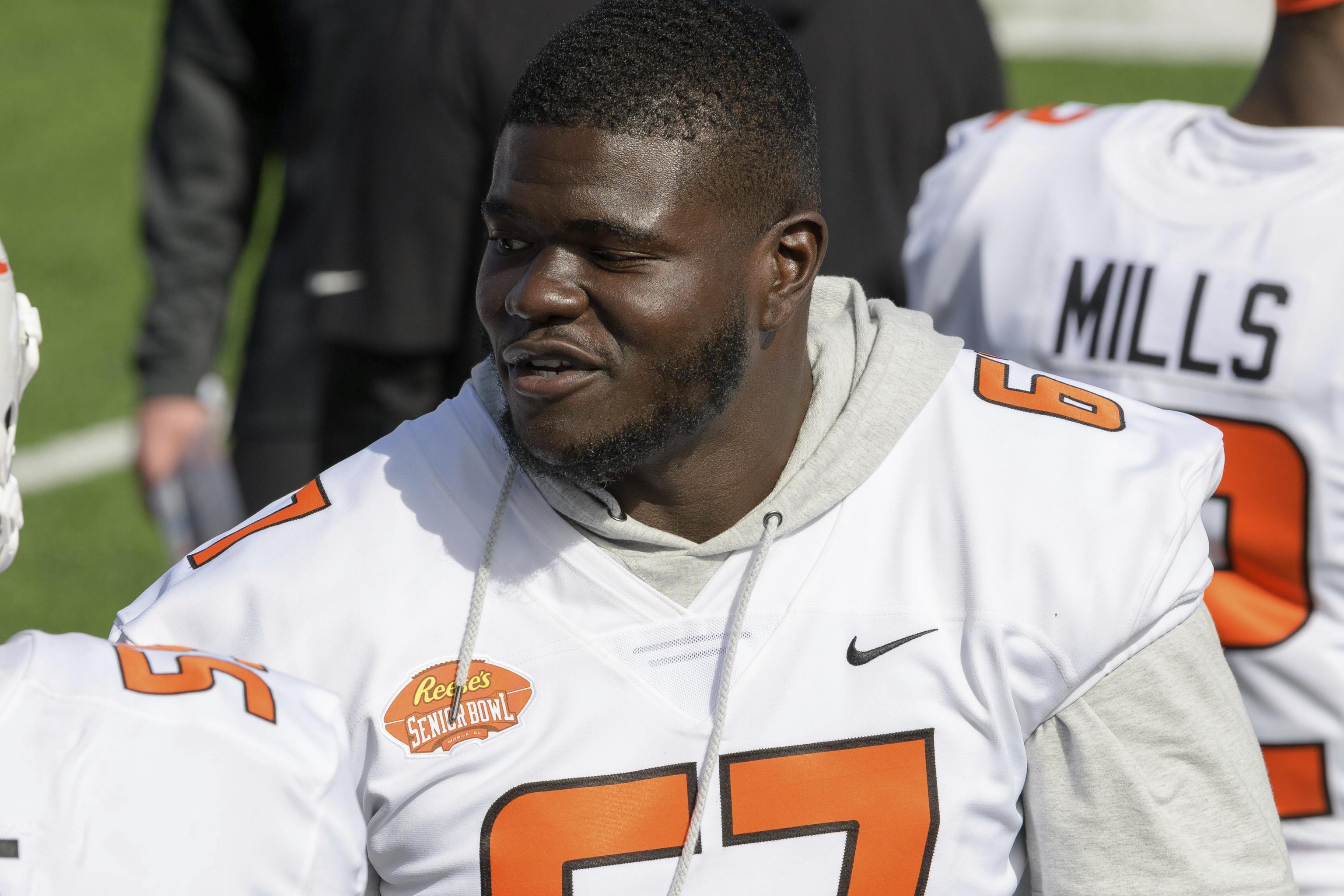 Cincinnati Bengals guard D'Ante Smith (70) looks to make a block