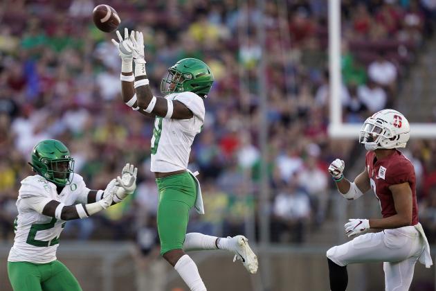 Oregon safety Jevon Holland, center, intercepts a pass in front of Stanford wide receiver Osiris St. Brown, right, during the second half of an NCAA college football game on Saturday, Sept. 21, 2019, in Stanford, Calif. (AP Photo/Tony Avelar)