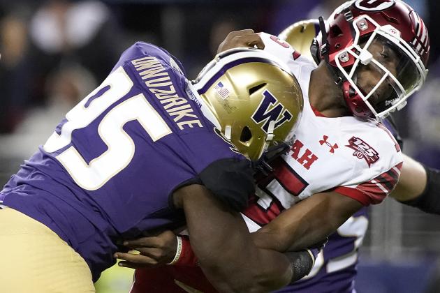 Washington defensive lineman Levi Onwuzurike (95) hits Utah quarterback Jason Shelley after Shelley threw a pass during the first half of the Pac-12 Conference championship NCAA college football game in Santa Clara, Calif., Friday, Nov. 30, 2018. (AP Photo/Tony Avelar)