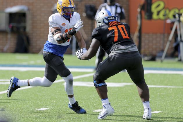 National Team defensive lineman Rashad Weaver of Pittsburgh (17) rushes as offensive lineman Robert Jones of Middle Tennessee (70) defends during the National team practice for the NCAA college Senior Bowl in Mobile, Ala., Wednesday, Jan. 27, 2021. (AP Photo/Rusty Costanza)