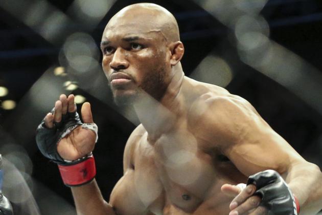 Kamaru Usman during a UFC 261 mixed martial arts fight early Sunday morning, April 25, 2021, in Jacksonville, Fla. This is the first UFC event since the onset of the COVID-19 pandemic to feature a full crowd in attendance. (AP Photo/Gary McCullough)