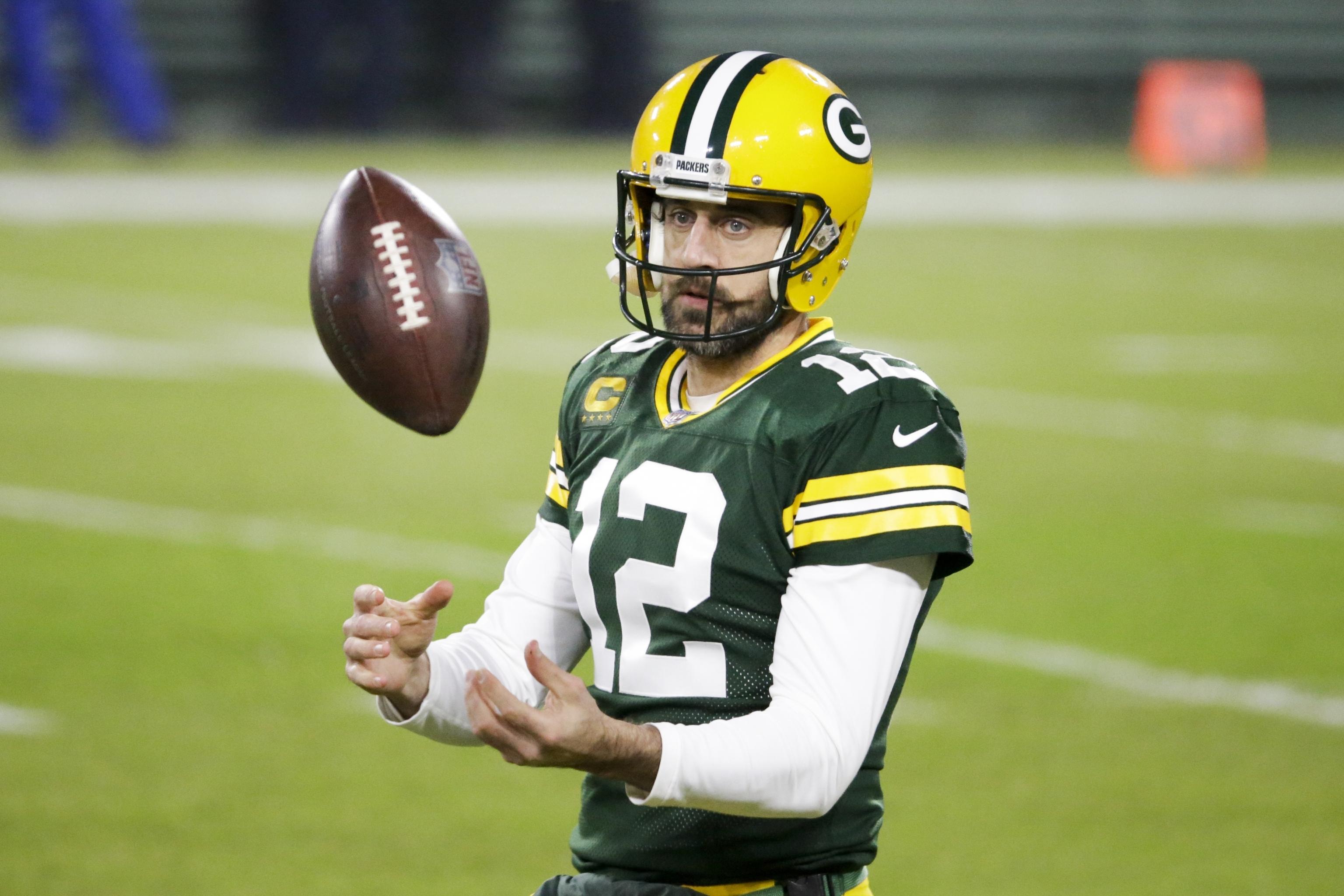 Acme Packing Company - Does Aaron Rodgers really want an opt out clause in  his next contract? He isn't talking.