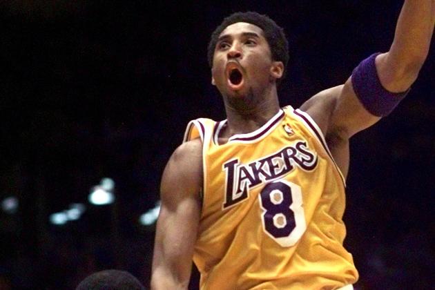 FILE - In this Marcy 28, 1999, file photo, Los Angeles Lakers' Kobe Bryant shoots over New York Knicks' Patrick Ewing during the first half of an NBA basketball game in Inglewood, Calif. The Lakers announced Tuesday, Sept. 12, 2017,  that they will retire Bryant’s No. 8 and No. 24 in a ceremony Dec. 18 during their game against Golden State. Bryant wore No. 8 from 1996 to 2006, when he switched to No. 24 for the remainder of his 20-year career with the Lakers. He will be the 10th player honored by the Lakers with a jersey retirement, and the first to have two retired numbers. (AP Photo/Mark J. Terrill, File)