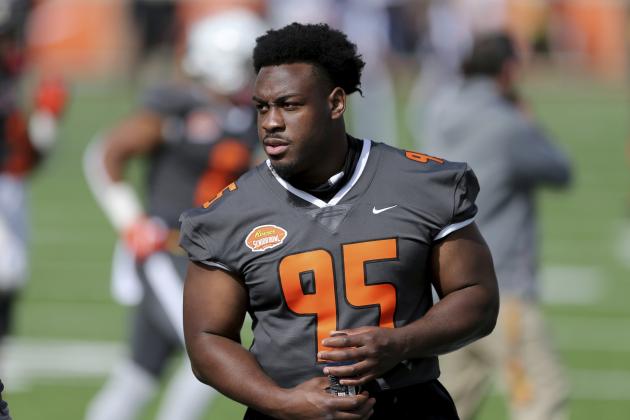 National Team defensive lineman Levi Onwuzurike of Washington (95) watches during the first half of the NCAA college football Senior Bowl in Mobile, Ala, Saturday, Jan. 30, 2021. (AP Photo/Rusty Costanza)