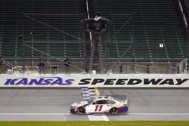 Denny Hamlin (11) wins a NASCAR Cup Series auto race at Kansas Speedway in Kansas City, Kan., Thursday, July 23, 2020. (AP Photo/Charlie Riedel)