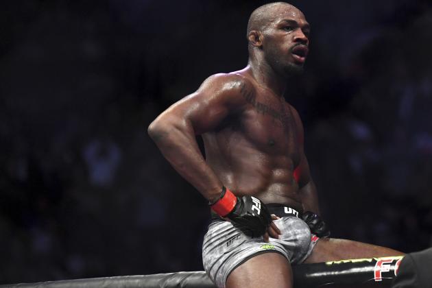 Jon Jones goes up on top of the octagon after defeating Alexander Gustafsson in the UFC men's light heavyweight mixed martial arts bout at UFC 232, Saturday, Dec. 29, 2018, in Inglewood, Calif. (AP Photo/Kyusung Gong)