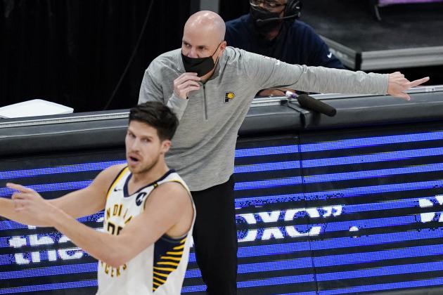Indiana Pacers head coach Nate Bjorkgren directs his team behind Indiana Pacers forward Doug McDermott (20) during the second half of a basketball game against the Washington Wizards, Monday, May 3, 2021, in Washington. (AP Photo/Alex Brandon)