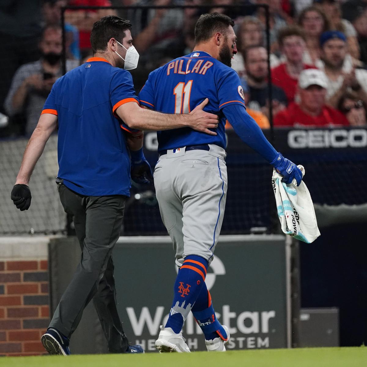 ATLANTA, GA – JUNE 29: New York center fielder Kevin Pillar (11) wears a  mask in the field during the MLB game between the New York Mets and the  Atlanta Braves on