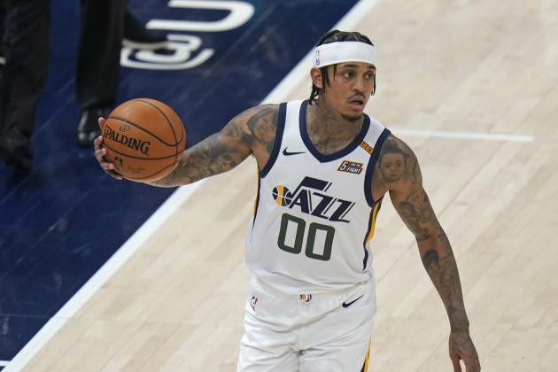 Utah Jazz guard Jordan Clarkson (00) brings the ball up court during the second half of Game 1 of their NBA basketball first-round playoff series against the Memphis Grizzlies Sunday, May 23, 2021, in Salt Lake City. (AP Photo/Rick Bowmer)