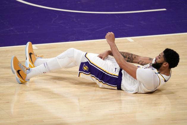 Los Angeles Lakers forward Anthony Davis takes a fall during the second half in Game 4 of an NBA basketball first-round playoff series against the Phoenix Suns Sunday, May 30, 2021, in Los Angeles. (AP Photo/Mark J. Terrill) Los Angeles Lakers forward Anthony Davis takes a fall during the second half in Game 4 of an NBA basketball first-round playoff series against the Phoenix Suns Sunday, May 30, 2021, in Los Angeles. (AP Photo/Mark J. Terrill)