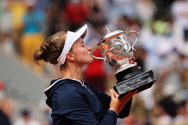 PARIS, FRANCE - JUNE 12: Match Winner Barbora Krejcikova of Czech Republic kisses the winners trophy after the Women’s final on day fourteen of the 2021 French Open at Roland Garros on June 12, 2021 in Paris, France. (Photo by Clive Brunskill/Getty Images)