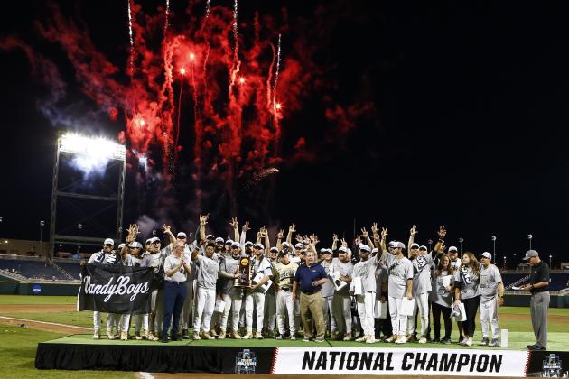 FILE - In a Wednesday, June 26, 2019 file photo, Vanderbilt players and coaches celebrate with the trophy after Vanderbilt defeated Michigan to win Game 3 of the NCAA College World Series baseball finals in Omaha, Neb. For the first time in seven decades, there is no college baseball in Omaha this summer. The eight-team College World Series would have started with opening-round games next weekend. The event has been a summer staple in Omaha since 1950. (AP Photo/John Peterson, File)