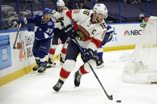 Florida Panthers center Aleksander Barkov (16) breaks out after taking the puck from Tampa Bay Lightning center Yanni Gourde (37) during the second period in Game 6 of an NHL hockey Stanley Cup first-round playoff series Wednesday, May 26, 2021, in Tampa, Fla. (AP Photo/Chris O'Meara)
