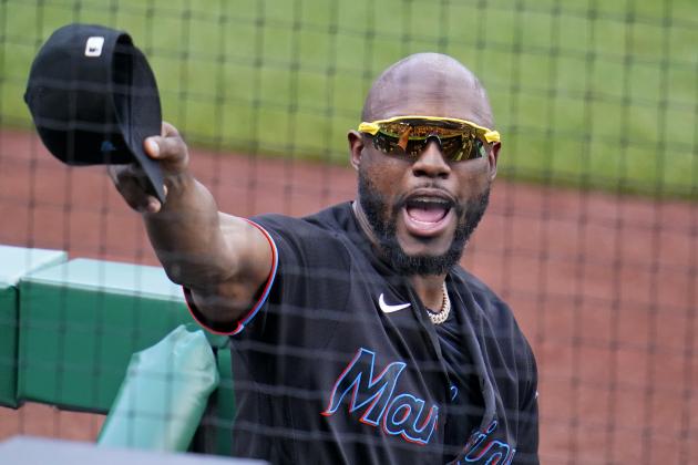 Miami Marlins' Starling Marte acknowledges an ovation from fans during a baseball game against his former team the Pittsburgh Pirates in Pittsburgh, Saturday, June 5, 2021. (AP Photo/Gene J. Puskar)