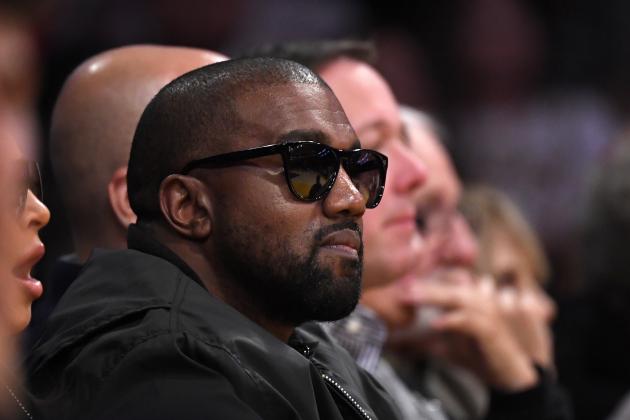 FILE - In this Jan. 13, 2020 file photo, Rapper Kanye West watches during the second half of an NBA basketball game between the Los Angeles Lakers and the Cleveland Cavaliers in Los Angeles. Drawings by WestÂ from when the rapper was a high school student in Chicago are now worth thousands of dollars, according to an appraiser. (AP Photo/Mark J. Terrill File)