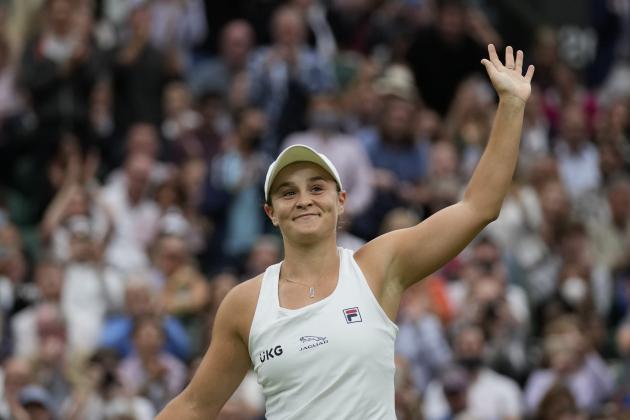Australia's Ashleigh Barty celebrates after defeating compatriot Ajla Tomljanovic during the women's singles quarterfinals match on day eight of the Wimbledon Tennis Championships in London, Tuesday, July 6, 2021. (AP Photo/Kirsty Wigglesworth)