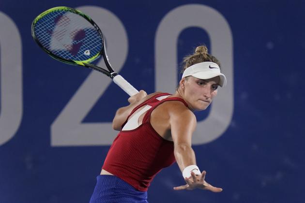 Marketa Vondrousova, of the Czech Republic, plays Elina Svitolina, of the Ukraine, during the semifinals of the tennis competition at the 2020 Summer Olympics, Thursday, July 29, 2021, in Tokyo, Japan. (AP Photo/Seth Wenig)