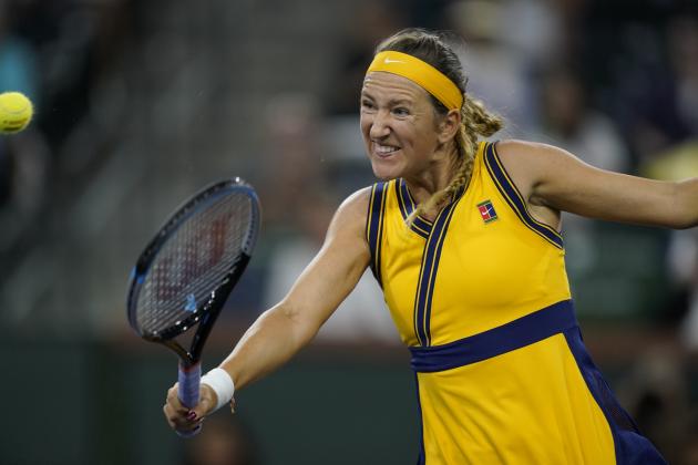 Victoria Azarenka, of Belarus, returns to Jelena Ostapenko, of Latvia, at the BNP Paribas Open tennis tournament Friday, Oct. 15, 2021, in Indian Wells, Calif. (AP Photo/Mark J. Terrill)