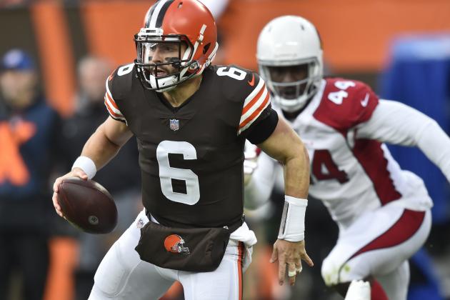 Cleveland Browns quarterback Baker Mayfield (6) scrambles against the Arizona Cardinals during the first half of an NFL football game, Sunday, Oct. 17, 2021, in Cleveland. (AP Photo/David Richard)