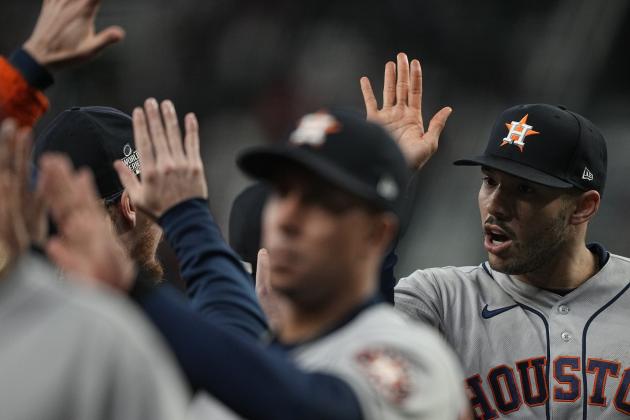 Houston Astros shortstop Carlos Correa celebrates their win in Game 5 of baseball's World Series between the Houston Astros and the Atlanta Braves Monday, Nov. 1, 2021, in Atlanta. The Astros won 9-5. The Braves lead the series 3-2 games. (AP Photo/David J. Phillip)