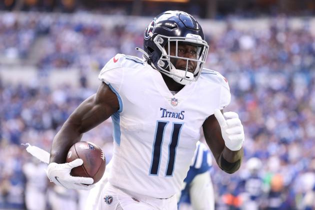 INDIANAPOLIS, INDIANA - OCTOBER 31: A.J. Brown #11of the Tennessee Titans runs for a touchdown against the Indianapolis Colts at Lucas Oil Stadium on October 31, 2021 in Indianapolis, Indiana. (Photo by Andy Lyons/Getty Images)