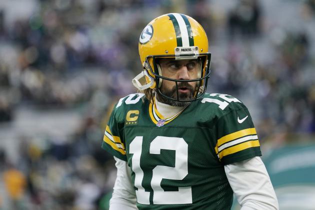 GREEN BAY, WISCONSIN - NOVEMBER 28: Aaron Rodgers #12 of the Green Bay Packers looks on during pregame warm-ups before the game against the Los Angeles Rams at Lambeau Field on November 28, 2021 in Green Bay, Wisconsin. (Photo by Patrick McDermott/Getty Images)