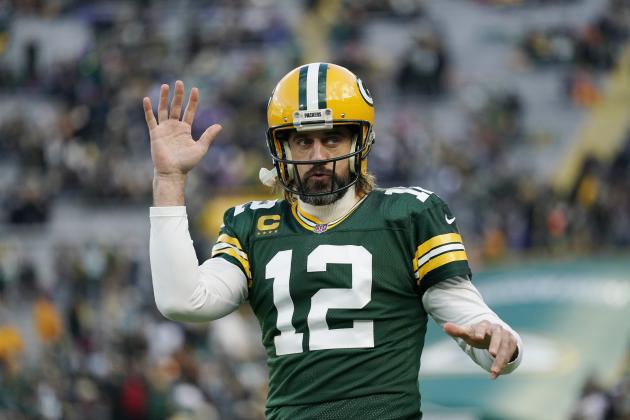 GREEN BAY, WISCONSIN - NOVEMBER 28: Aaron Rodgers #12 of the Green Bay Packers looks on during pregame warm-ups before the game against the Los Angeles Rams at Lambeau Field on November 28, 2021 in Green Bay, Wisconsin. (Photo by Patrick McDermott/Getty Images)