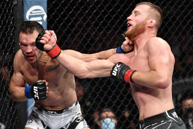 NEW YORK, NEW YORK - NOVEMBER 06: (R-L) Justin Gaethje and Michael Chandler trade punches in their lightweight fight during the UFC 268 event at Madison Square Garden on November 06, 2021 in New York City. (Photo by Jeff Bottari/Zuffa LLC)