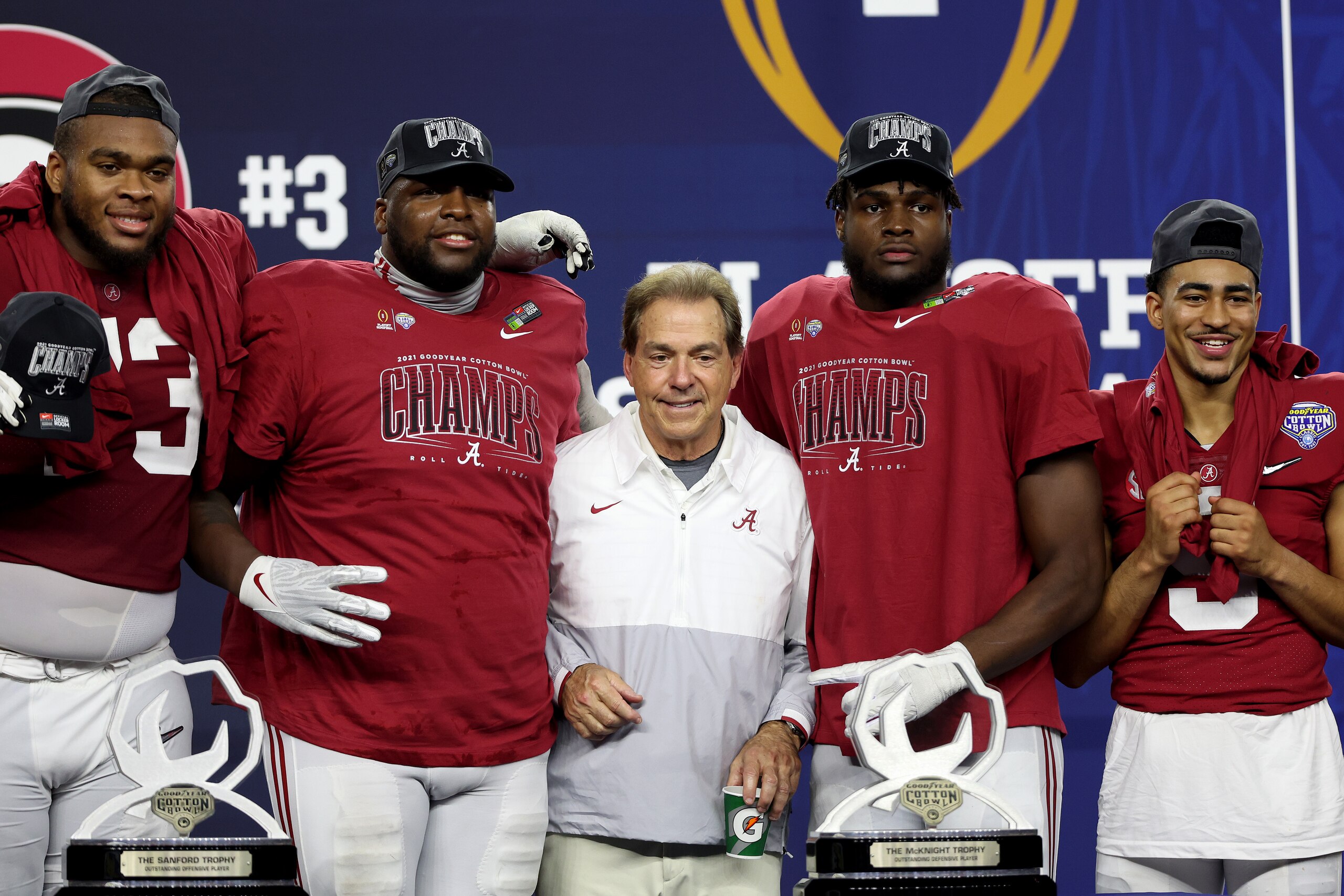 ARLINGTON, TEXAS - DECEMBER 31: Head coach Nick Saban of the Alabama Crimson Tide celebrates with the team after the Alabama Crimson Tide defeated the Cincinnati Bearcats 27-6 in the Goodyear Cotton Bowl Classic for the College Football Playoff semifinal game at AT&T Stadium on December 31, 2021 in Arlington, Texas. (Photo by Matthew Stockman/Getty Images)