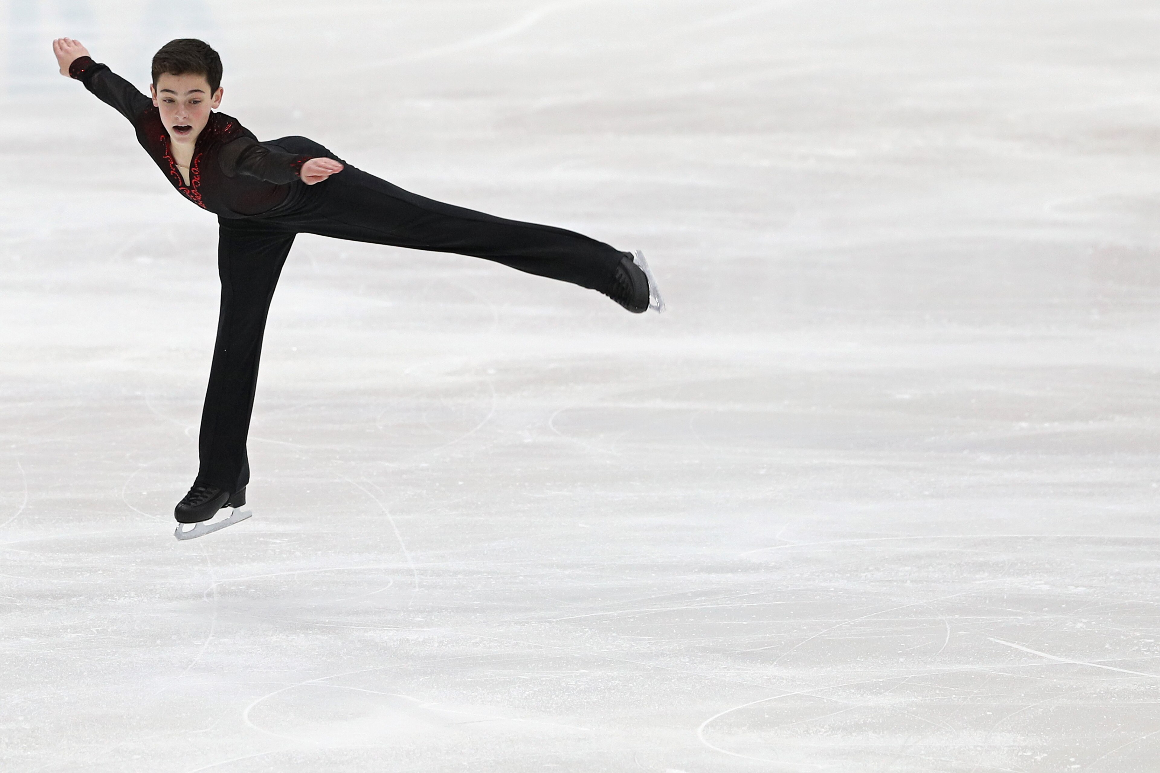 LAKE PLACID, NEW YORK - AUGUST 30: Joseph Klein of the United States performs in the Men's Free Skate during Day 2 of the ISU Junior Grand Prix of Figure Skating at Herb Brooks Arena on August 30, 2019 in Lake Placid, New York. (Photo by Patrick Smith - - International Skating Union/International Skating Union via Getty Images)