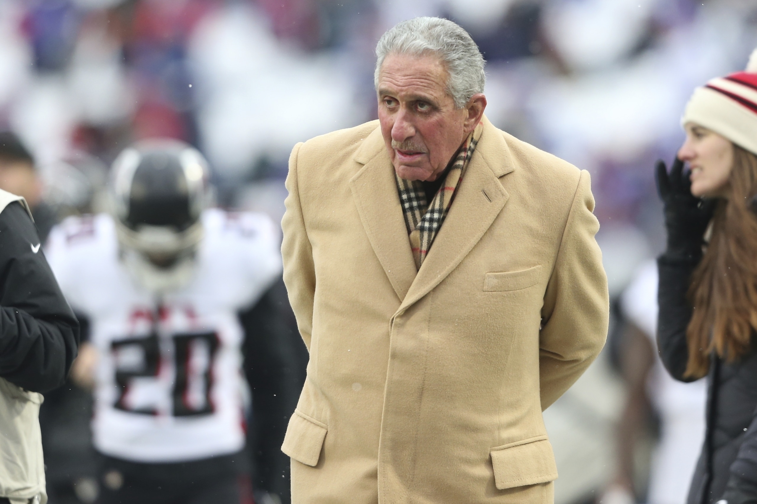 Atlanta Falcons Owner Arthur Blank watches his players warm up before an NFL football game against the Buffalo Bills Sunday, Jan. 2, 2022, in Orchard Park, N.Y. (AP Photo/Joshua Bessex)